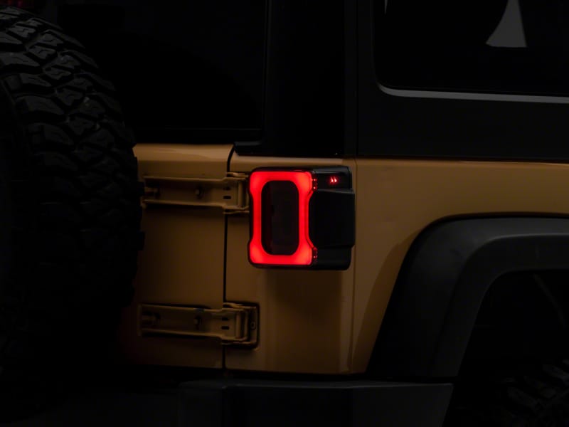 Raxiom 07-18 Jeep Wrangler JK Axial Series Carver LED Tail Lights- Black Housing (Smoked Lens)