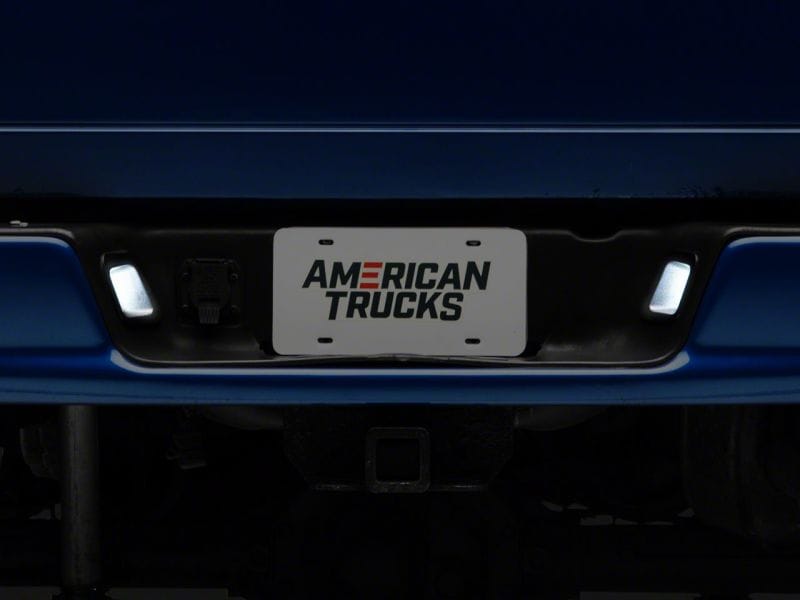 Raxiom 03-18 Dodge RAM 1500 Axial Series LED License Plate Lamps thumbnail 2