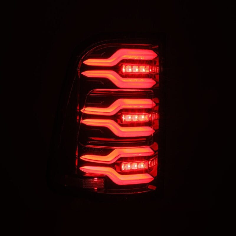 AlphaRex 19-21 Dodge Ram 1500 Luxx-Series LED Tail Lights Alpha-Black w/Activ Light/Seq Signal thumbnail 4