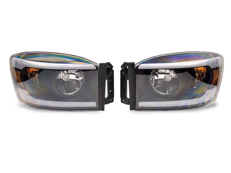 Raxiom 06-09 Dodge RAM 1500/2500/3500 Axial Headlights w/ SEQL LED Bar- Black Housing (Clear Lens) thumbnail 2