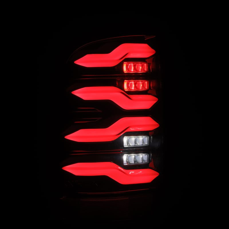 AlphaRex 09-18 Dodge Ram Luxx-Series LED Tail Lights Black w/ Activation Light & Sequential Signal thumbnail 3