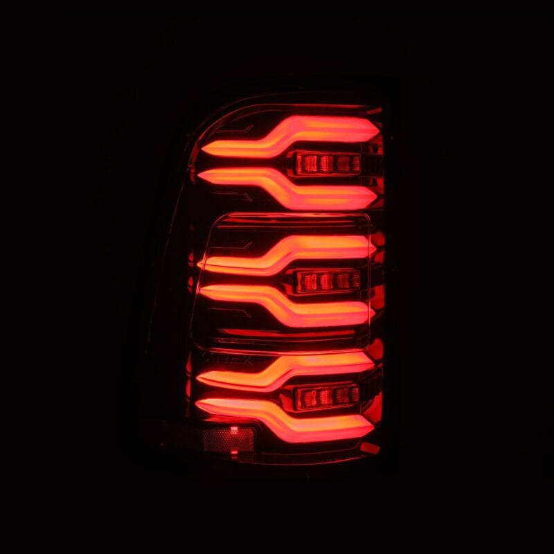 AlphaRex 19-21 Dodge Ram 1500 Luxx-Series LED Tail Lights Alpha-Black w/Activ Light/Seq Signal thumbnail 3