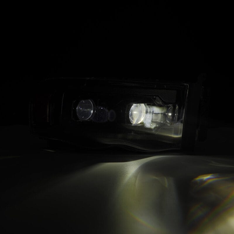 AlphaRex 02-05 Dodge Ram 1500 PRO-Series Projector Headlights Plank Style Alpha Black w/Seq Signal thumbnail 3