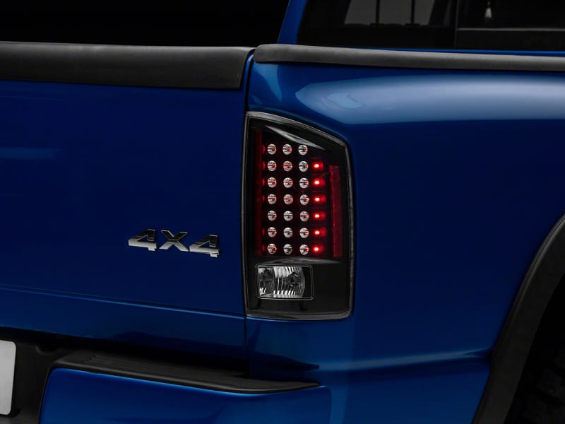 Raxiom 07-08 Dodge RAM 1500 LED Tail Lights- Black Housing (Clear Lens)