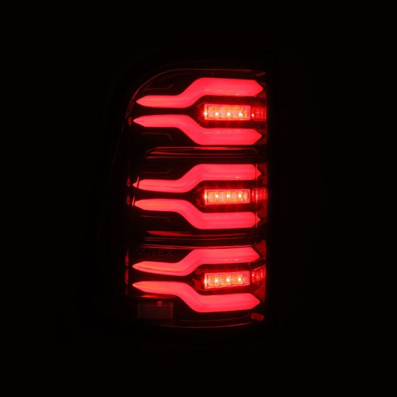 AlphaRex 19-21 Dodge Ram 1500 Luxx-Series LED Tail Lights Black/Red w/Activ Light/Seq Signal thumbnail 4