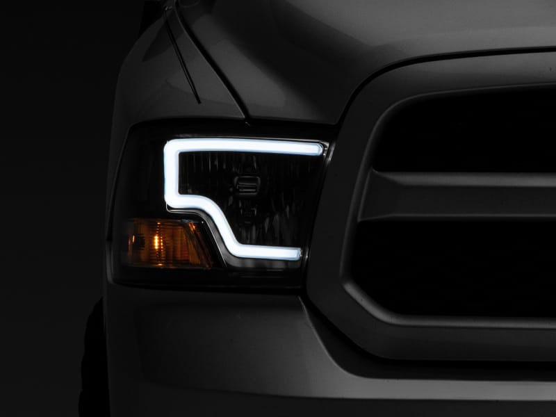 Raxiom 09-18 Dodge RAM 1500 LED Bar Headlights- Black Housing (Clear Lens) thumbnail 2
