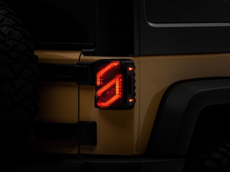 Raxiom 07-18 Jeep Wrangler JK Axial Series Trident LED Tail Lights- Black Housing (Clear Lens)