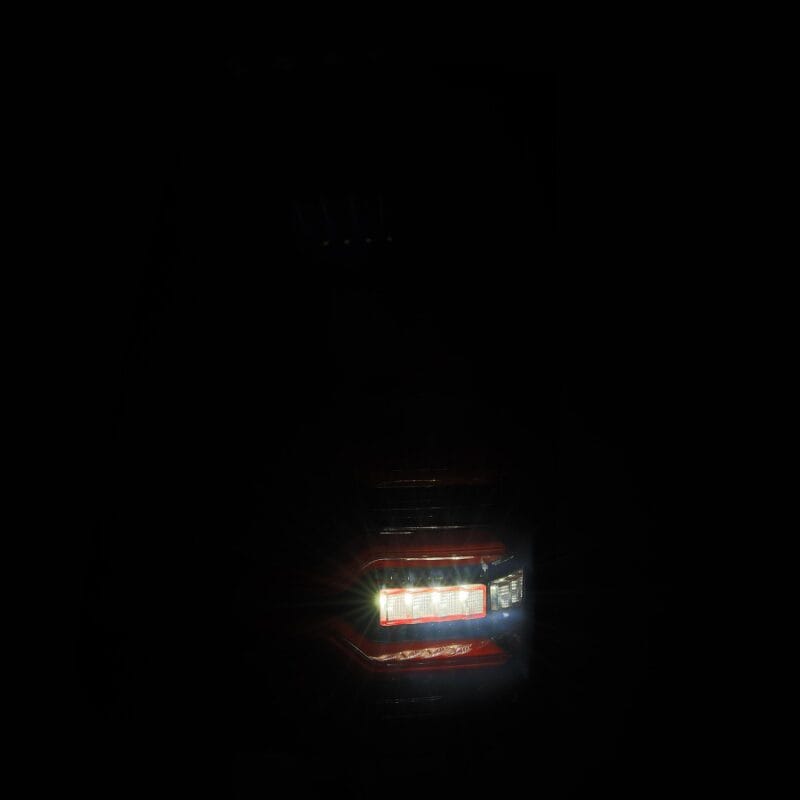 AlphaRex 19-21 Dodge Ram 1500 Luxx-Series LED Tail Lights Black/Red w/Activ Light/Seq Signal thumbnail 6